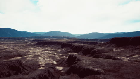 alien planet landscape: arid desert with mountains and canyons