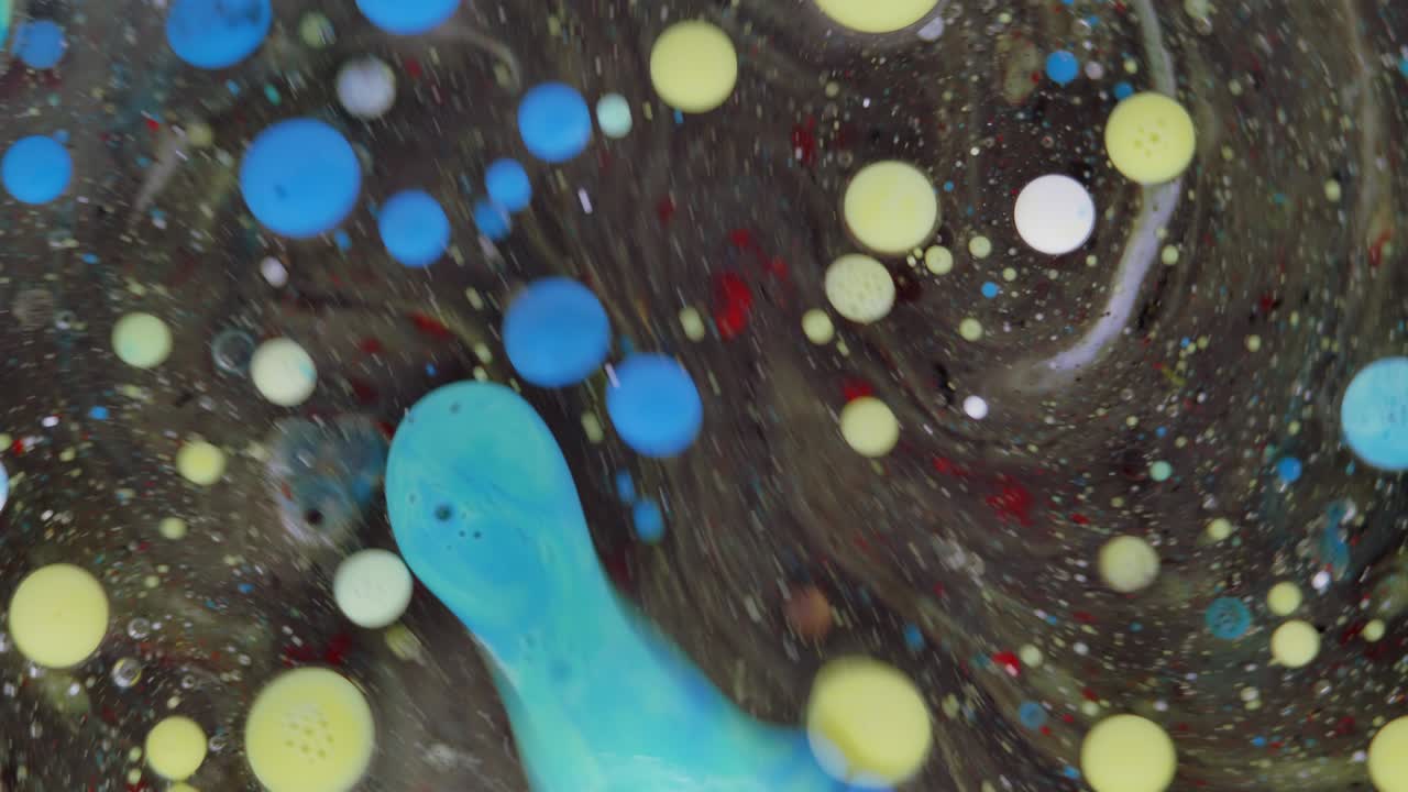 흑색 배경에 추상적인 노란색, 파란색 혼합물, 예술적인 색상 페인트 배경.