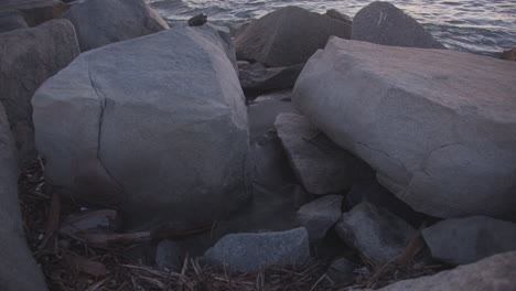 the tide in slow-motion between seaside rocks