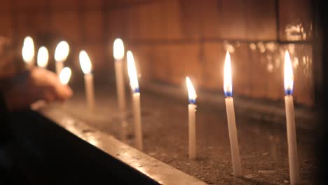 candles burning in a church