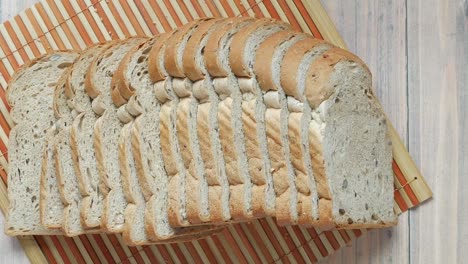 sliced whole wheat bread on a cutting board