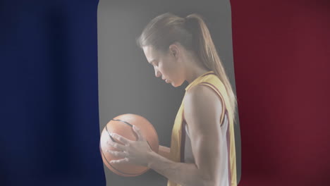 animation of flag of france over caucasian female basketball player