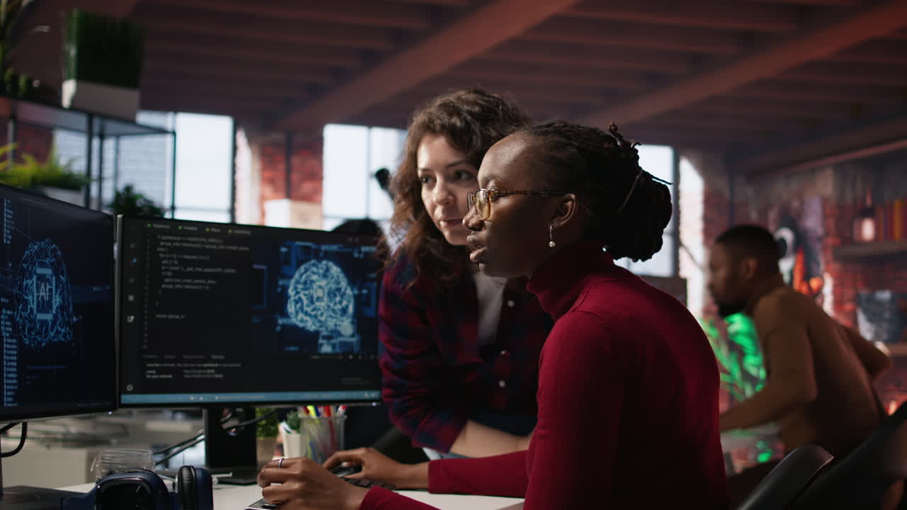 Teamworking engineers coding advanced AI algorithm in startup