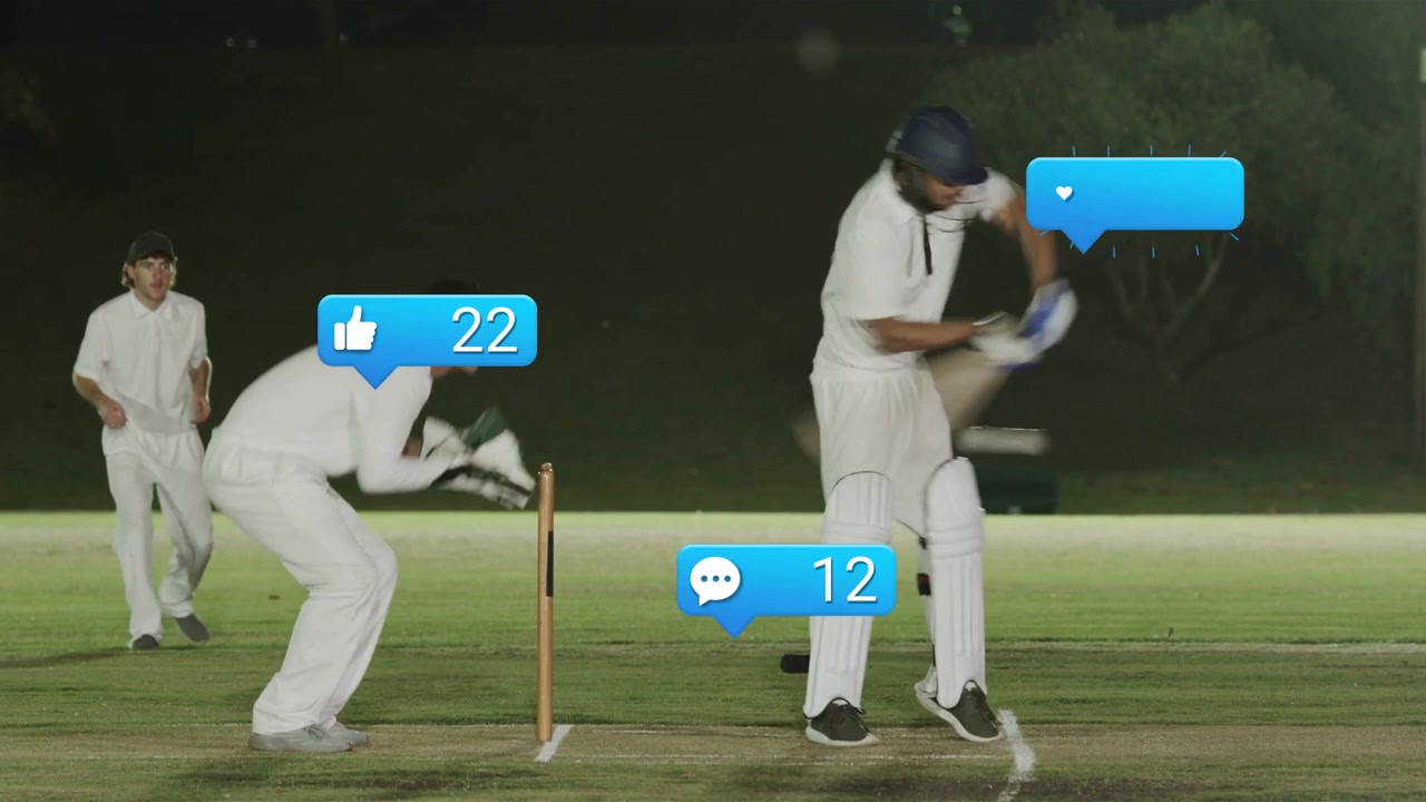 Cricket-slagmann justerer grepet og forflytter seg idet ballen kommer, keeper klapper, varsler viser antall fans