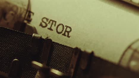 printing love story on paper with vintage typewriter