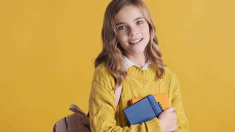 teenage caucasian girl student wearing backpack.