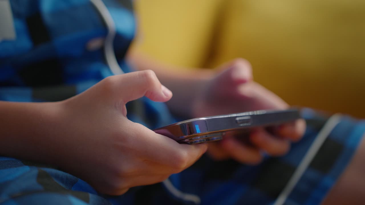 Child playing with a phone