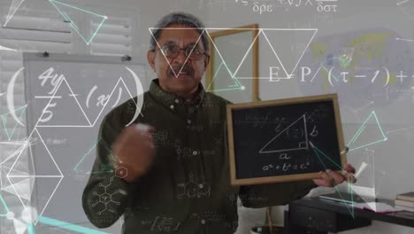 animation of mathematical equations over biracial male teacher holding blackboard