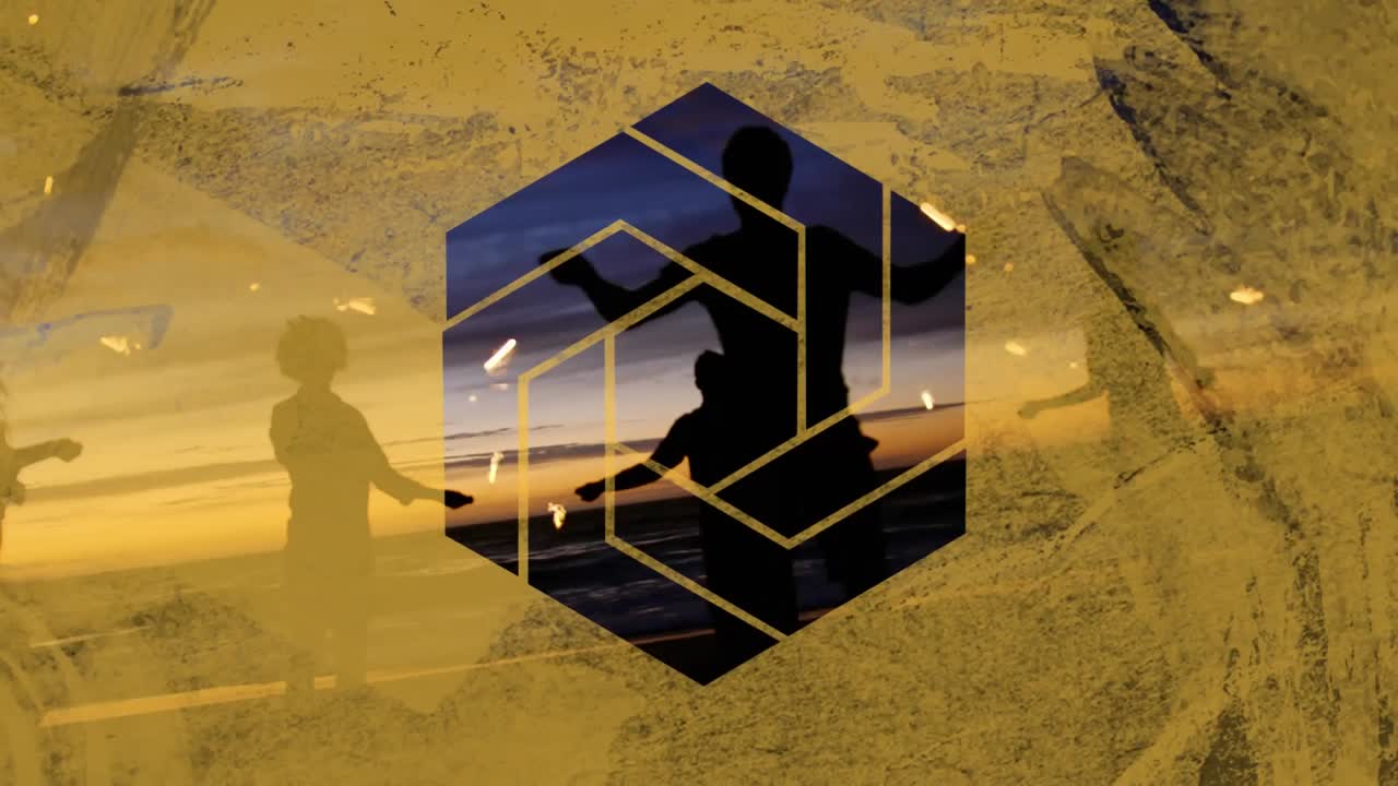 grupo de personas con siluetas en contra a través de un hexágono amarillo en primer plano