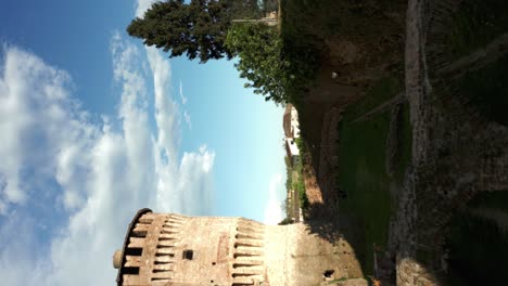 Vertical-Shot-Of-Soncino-Castle-And-Its-Surroundings-In-Northern-Italy---drone-shot