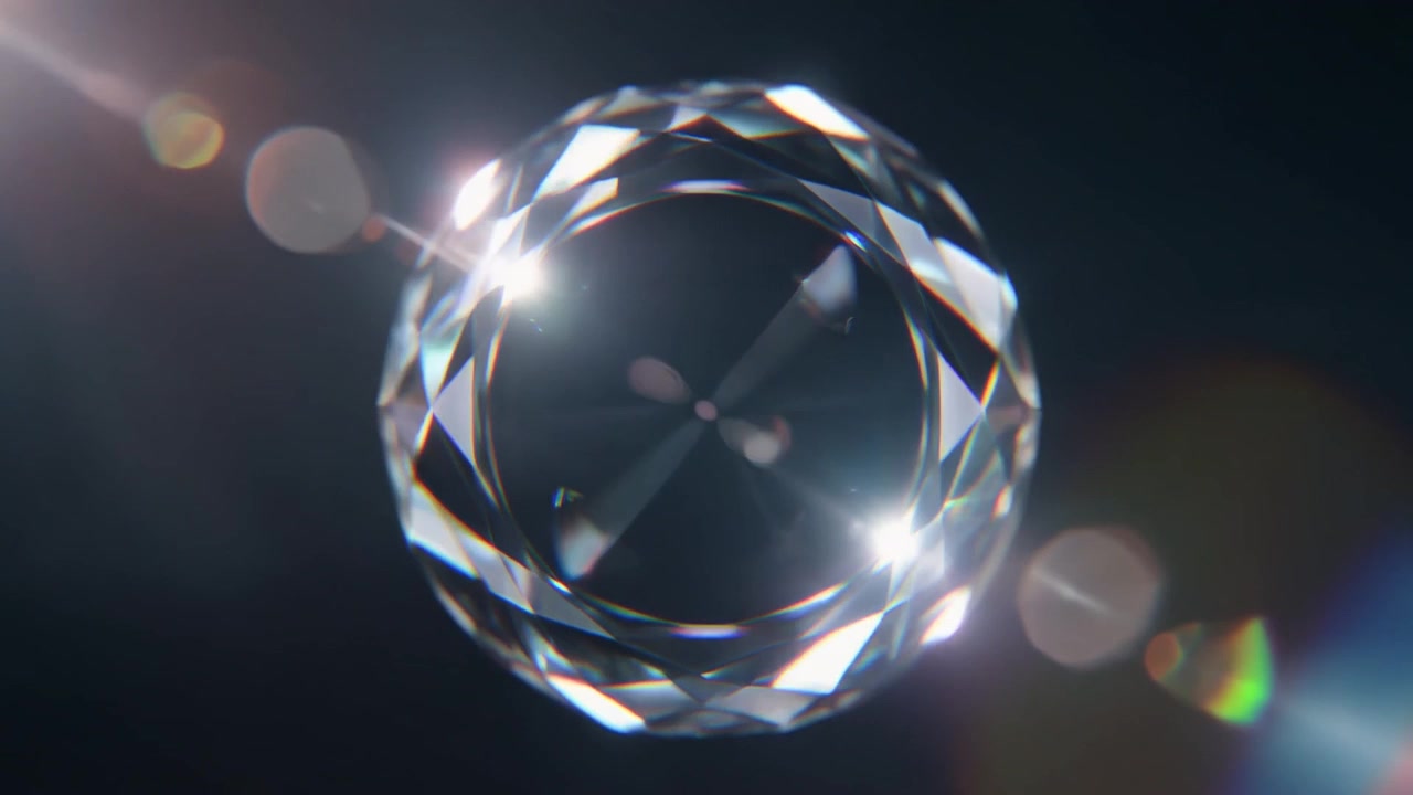 Rotating Diamond Gemstone with Lens Flare on Dark Background