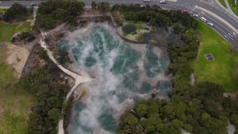 Hot-steaming-pool,-popular-attraction-in-Kuirau-Park,-Rotorua,-geothermal-active-area-in-New-Zealand
