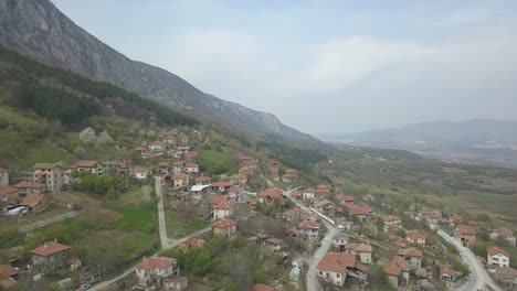 flying above houses in the mountain