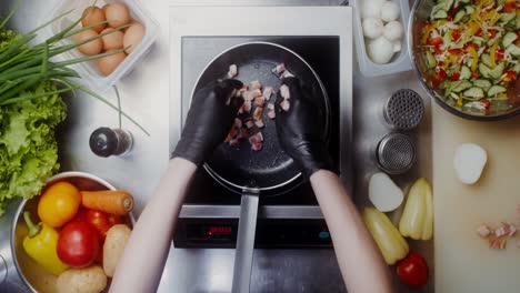 cooking bacon and preparing a meal