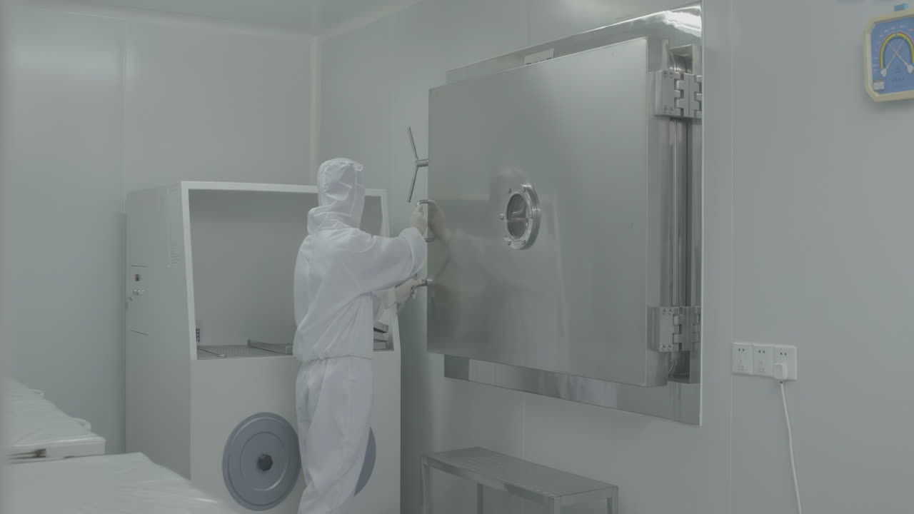 Medical worker operate storage of vaccine vial are stored in lab refrigerators inside sterile production facility to ensure safety quality during manufacturing process for medical research diagnostics