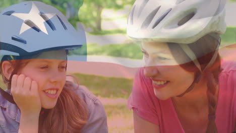 chile flag animation over two people wearing helmets and smiling outdoors
