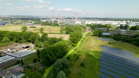 industrial area near gdansk in poland, solar panel farm, oil refinery, aerial