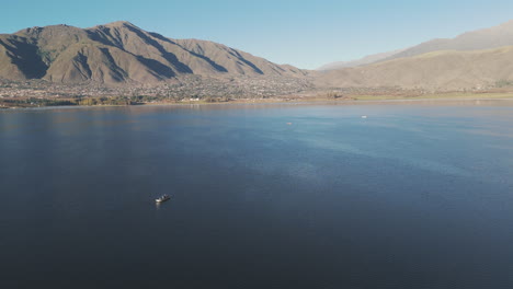 aerial tracking fishermen in fishing boat