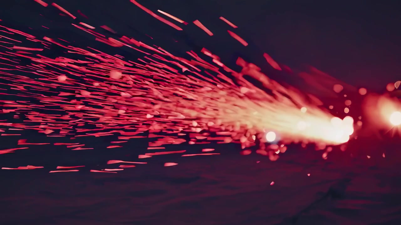 Video astratto con luci bokeh rosse sparse su uno sfondo scuro, ripreso dall'alto
