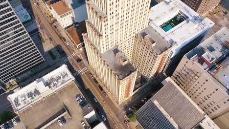 Good-aerial-of-downtown-Memphis-Tennessee-high-rises-skyscrapers-businesses-skyline-tilt-to-office-building