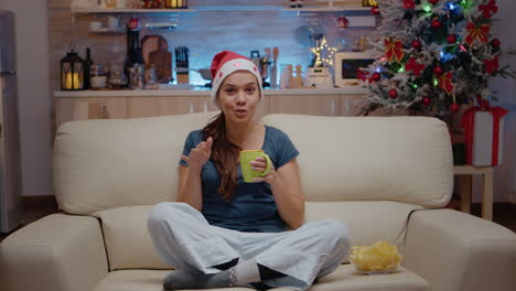 pov of festive woman talking on video call with family