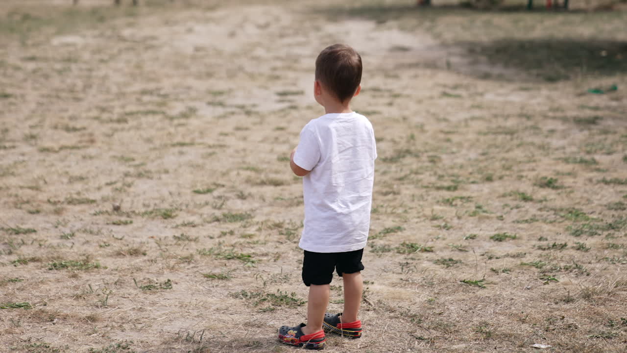 Toddler Playing Outdoors