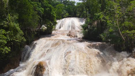 agua azul falls in chiapas, mexico after heavy rain, aerial 4k view over waterfall