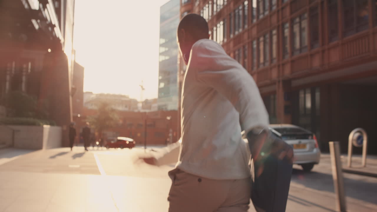 African American Businessman in trouble running away from danger