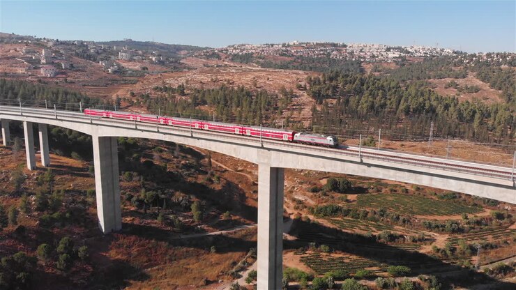 Train on large bridge aerial