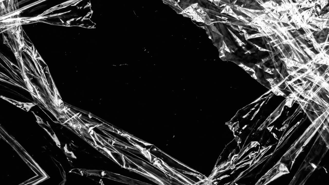 Sovrapposizione dinamica di pellicola trasparente su sfondo nero