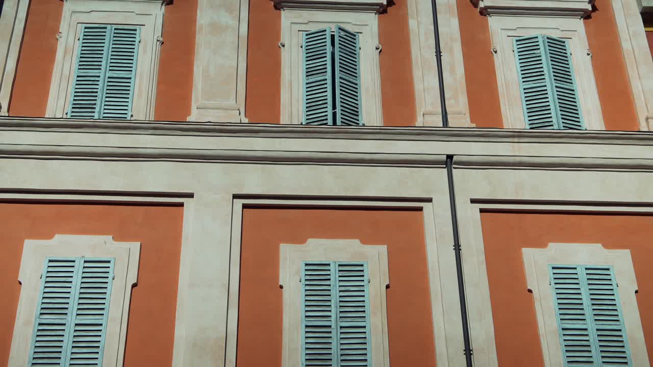 Classic Facade with Teal Shutters
