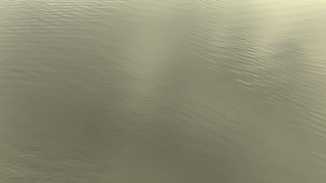 Aerial reverse reveal of Big Lagoon near Perdido Key, Florida