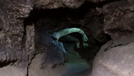 cinematic video of a dark cave in  format dark tunnel