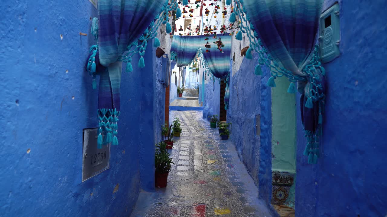 Chefchaouen, Morocco, the Blue Pearl, is a tranquil retreat with its soft blue tones and quiet streets nestled in the mountains
