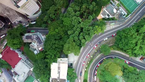 Vista-Aérea-De-Pájaro-Del-Tráfico-En-El-Centro-De-Hong-Kong,-Tiro-Estático-De-Drones