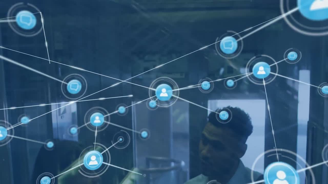Animation of network of digital icons against diverse man and woman discussing in elevator at office