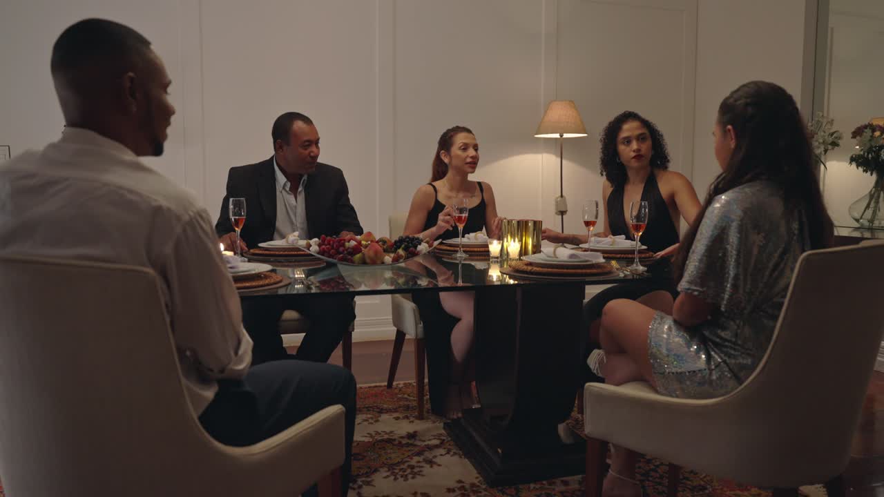 Friends and Family Enjoying a Lively Dinner Party