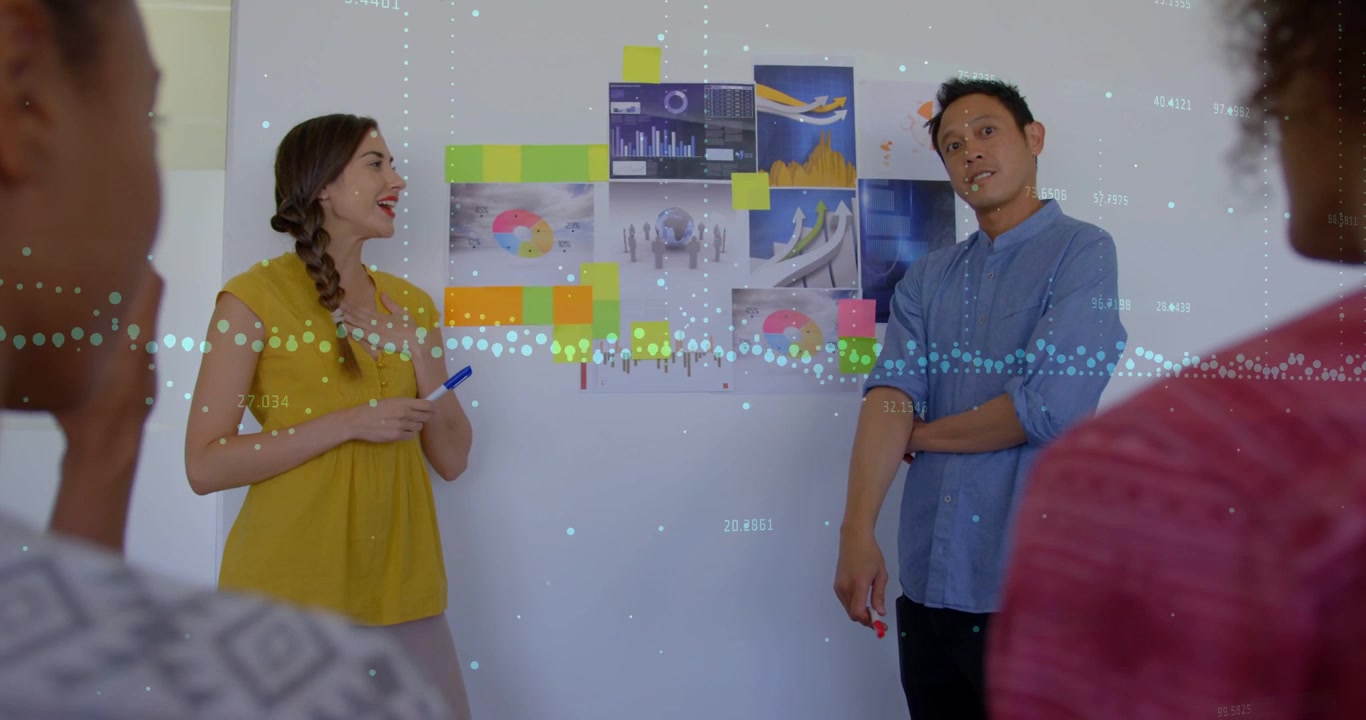 Woman holding blue marker starting design review, presenters pointing, waveform highlighting charts