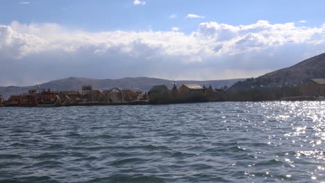 puma boats on lake titicaca used to travel the uros islands, puno, peru, south america