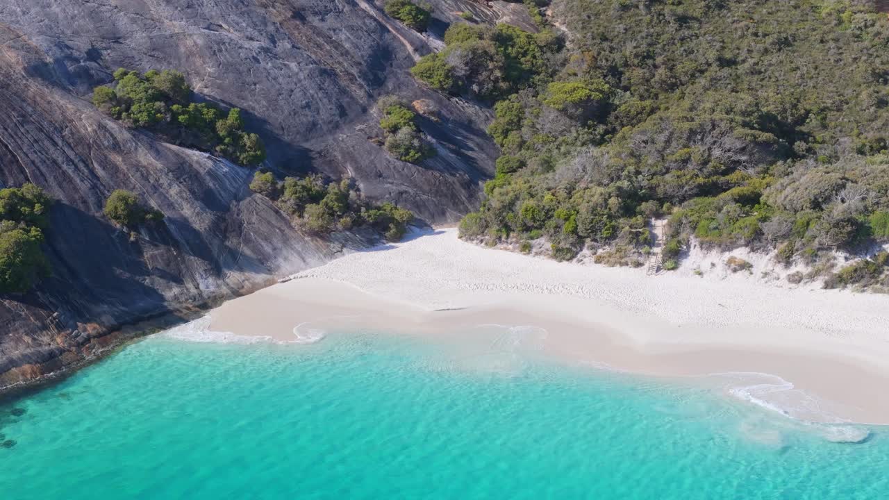Drone view of white sand beach secluded in a remote part of Australia