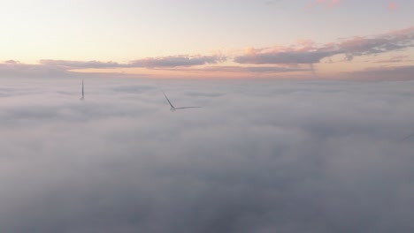 drone shot of a windturbine in cloudy conditions