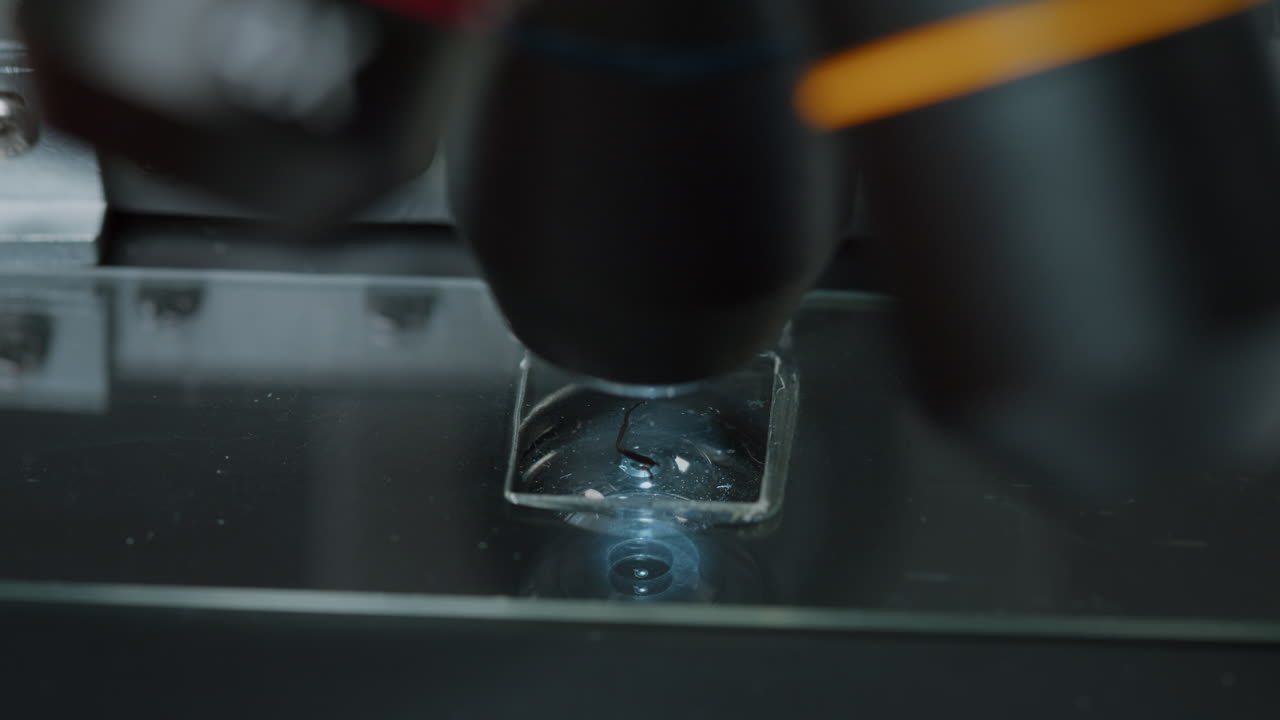 Microscope with magnifying glass and optical lens used for molecule research