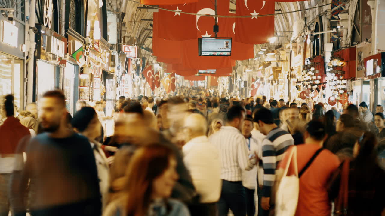 Timelapse wide view of a main pavement on Grand Bazaar in Istambul full of people