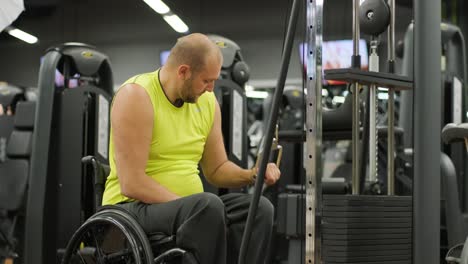 man with disabilities training in the gym of rehabilitation center