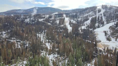 Aerial-Drone-pans-to-the-right-to-show-a-Ski-Resort-burned-by-a-wildfire