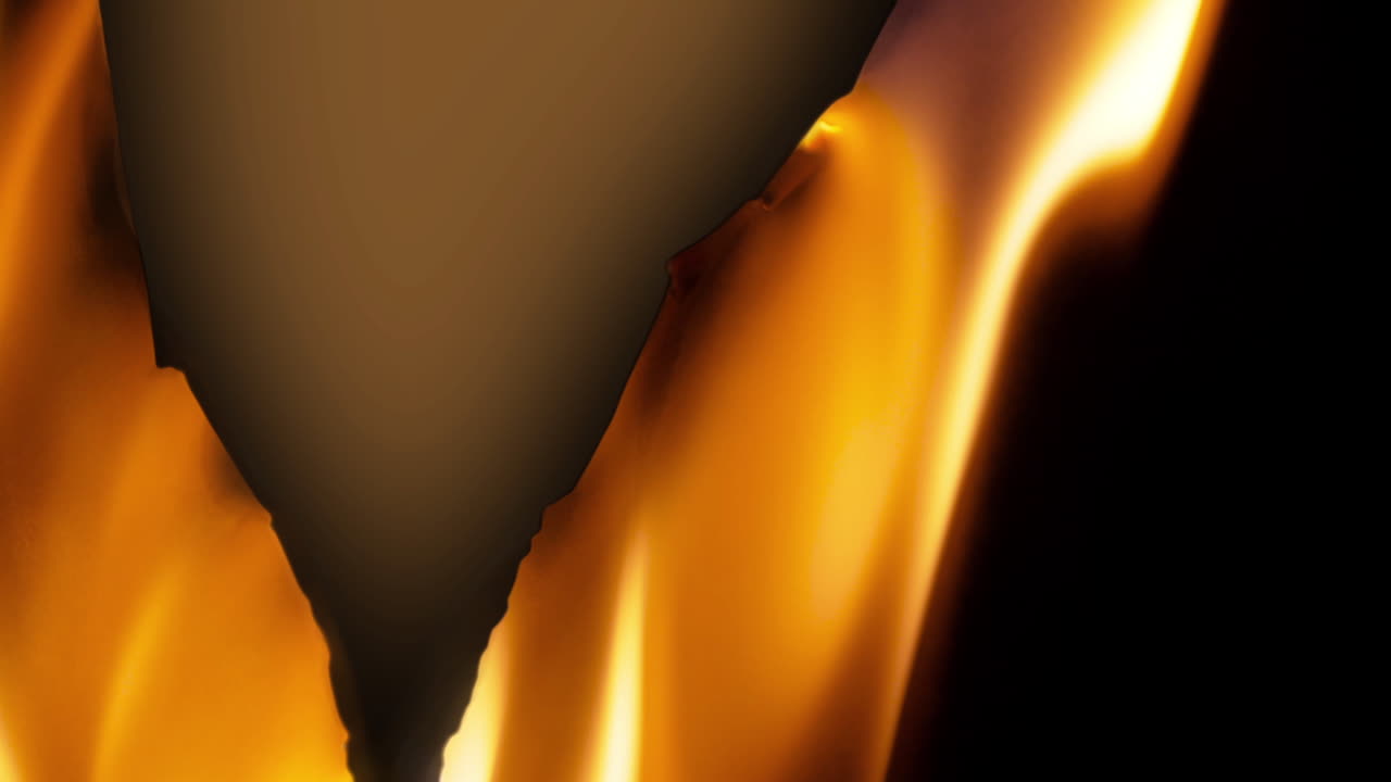 Dynamic Flames Burning on a Dark Background