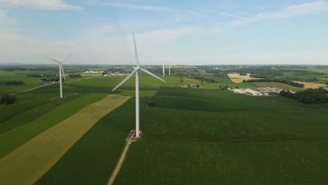 Increíble-Vista-Aérea-De-La-Turbina-Eólica-Con-Grandes-Rotores-Produce-Energía-Eólica