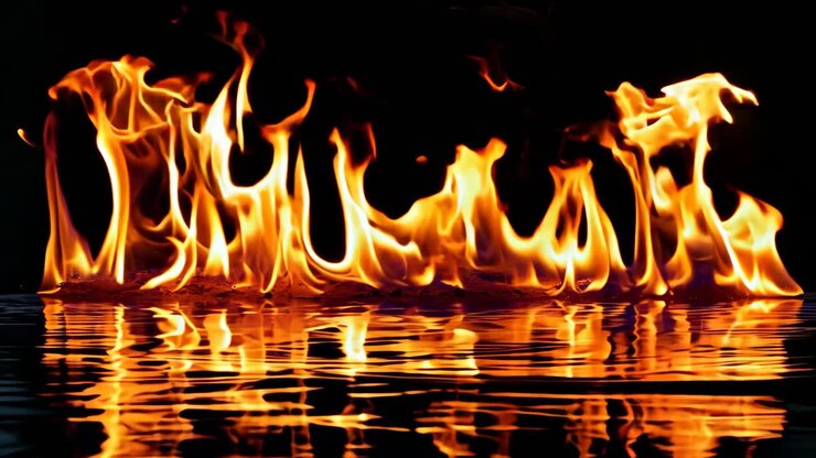 Eine Gruppe von Feuerflammen auf schwarzem Hintergrund