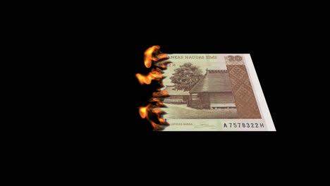 burning latvian lats banknote