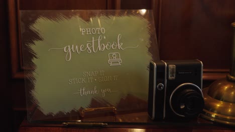 creative wedding event snapshot guest book with vintage style retro instant camera